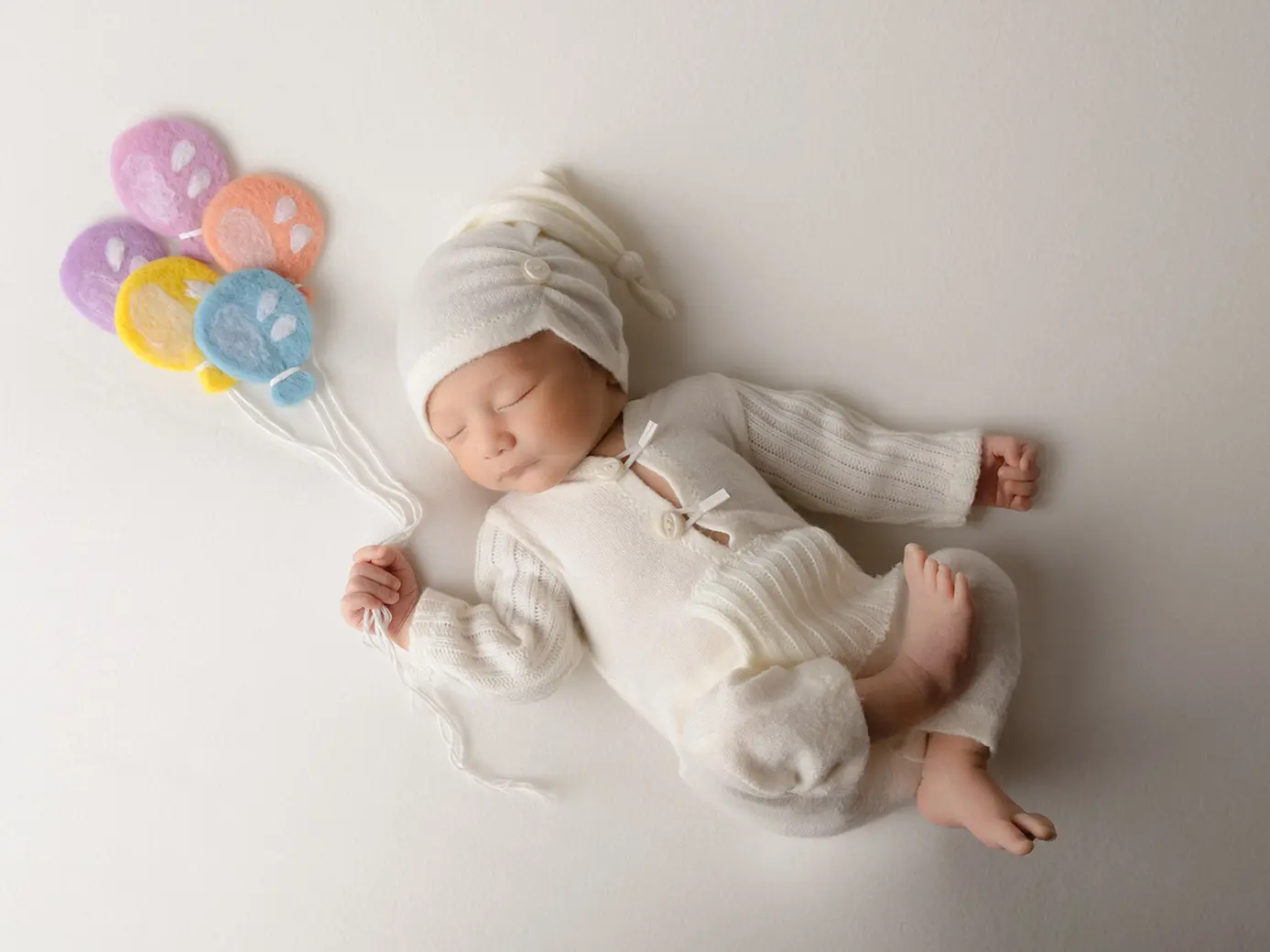 Babyfotografie mit Luftballons